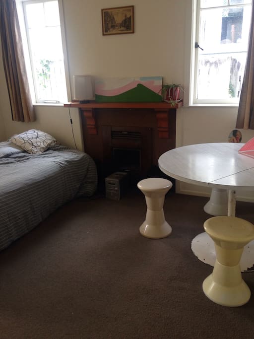 This is the space with the couch folded down. Comfortable for sleeping with room for people to have dinner and relax during the day . You will have privacy at night as there is another way to access the kitchen and bath room at night