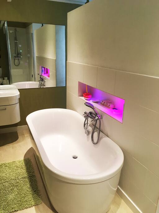 En suite bath with mood lighting