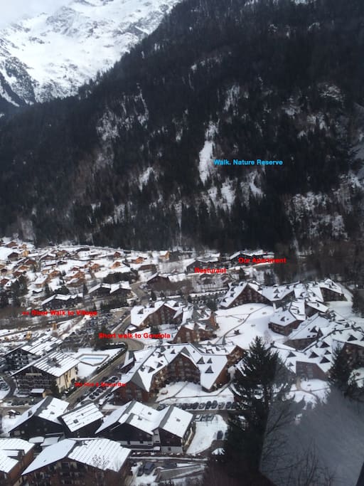 Les Contamines village. Follow the road from the Gondola @ Hameux Du Lay (centre of photo) Turn right at junction. Apartment block is last building on Left. 500meters! or short car ride to Notra Dame De La George.Free car parking at both gondolas.