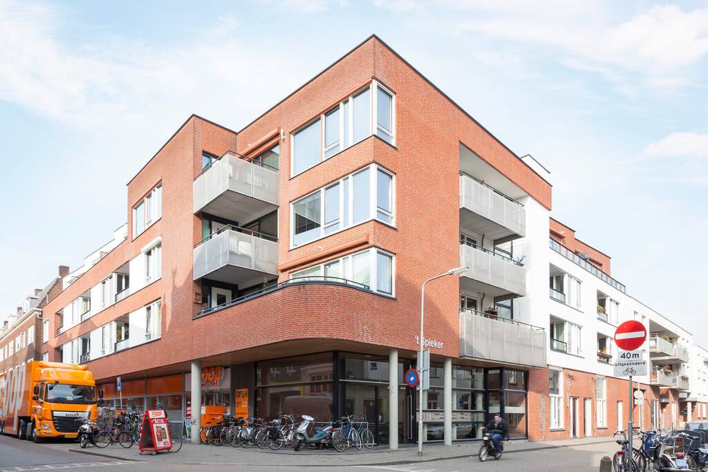 Small apartment building with 18 apartments and (very convenient!) a supermarket beneath it