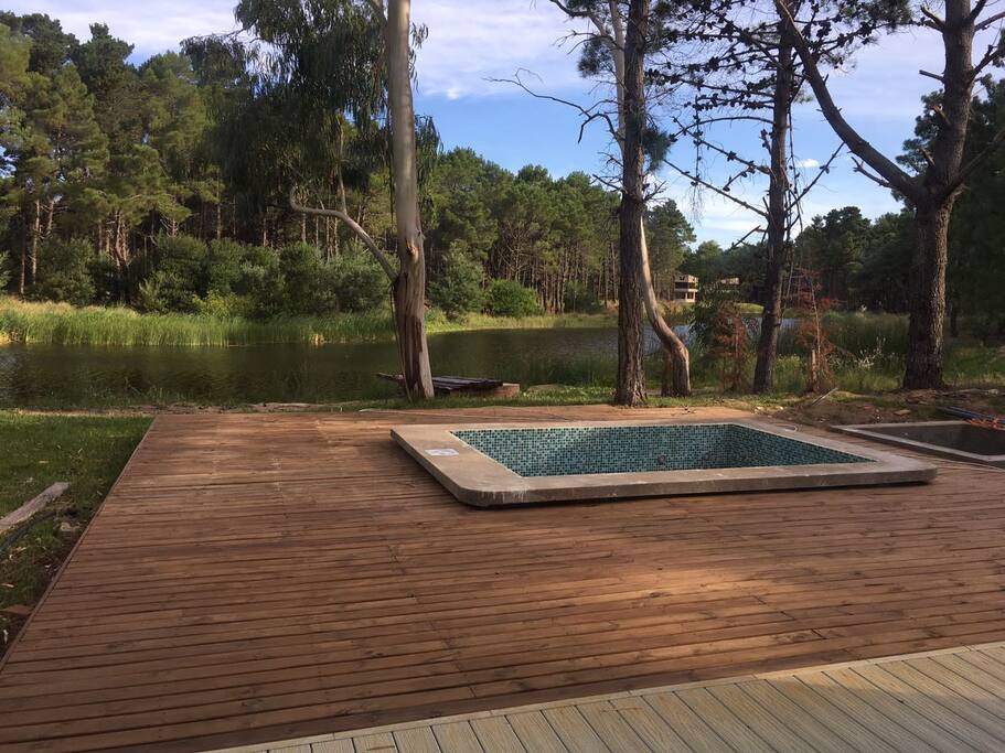 Piscina con solarium/Deck