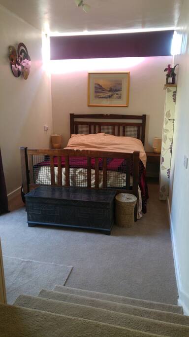 Your bedroom with TV, Freeview, Wifi, Tea & Coffee with easy access to outside.
