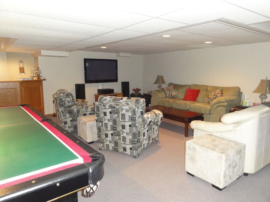 Entertainment Room
Features pool table, TV and shuffle board