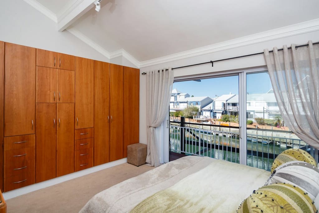 Main bedroom & ensuite with marina views