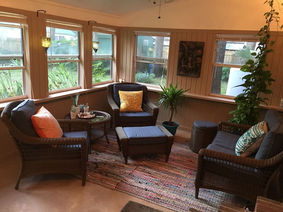 Cozy lanai nook for relaxing at the end of the day or waking up to in the morning.