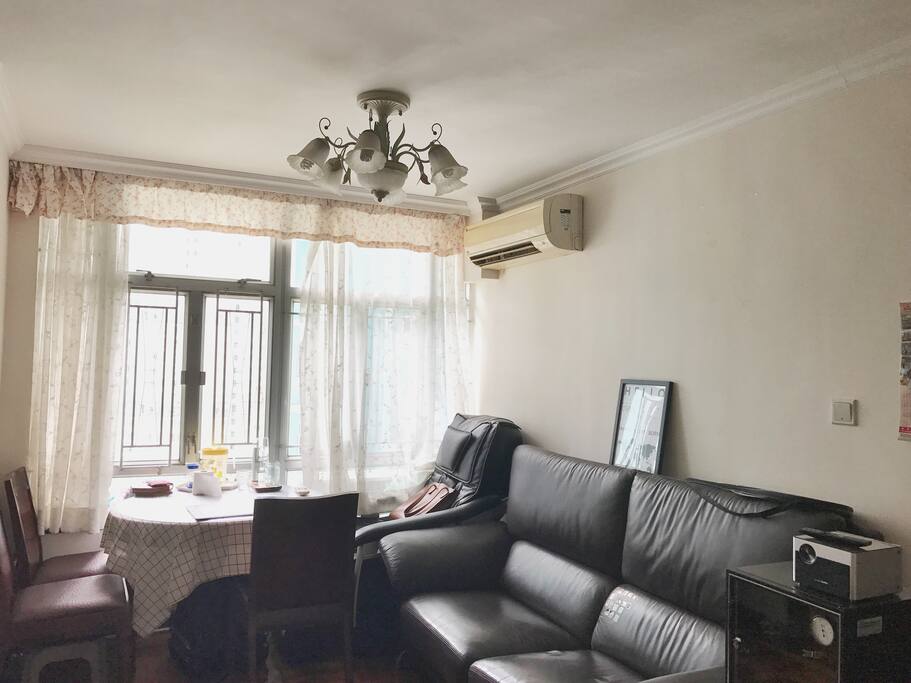 living room with table, sofa and projector for fun