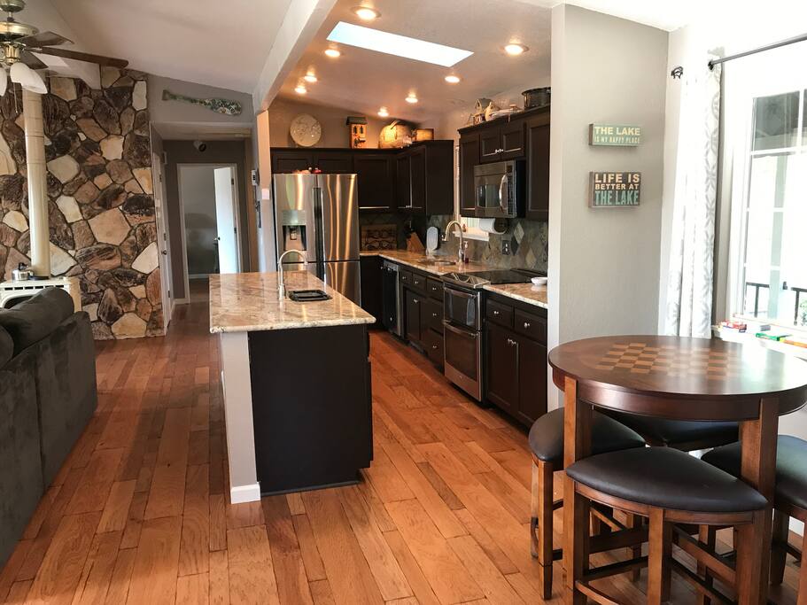 Kitchen is fully stocked with cooking supplies. Small appliances including a toaster, coffee machine, blender, electric mixer and crockpot are available.