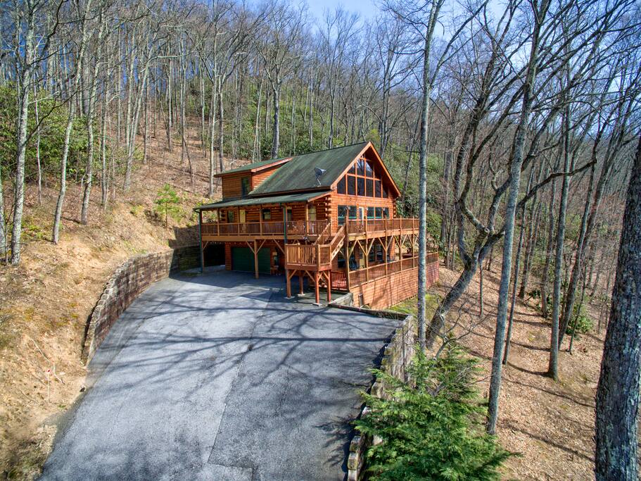 Driveway view 2 car garage and parking