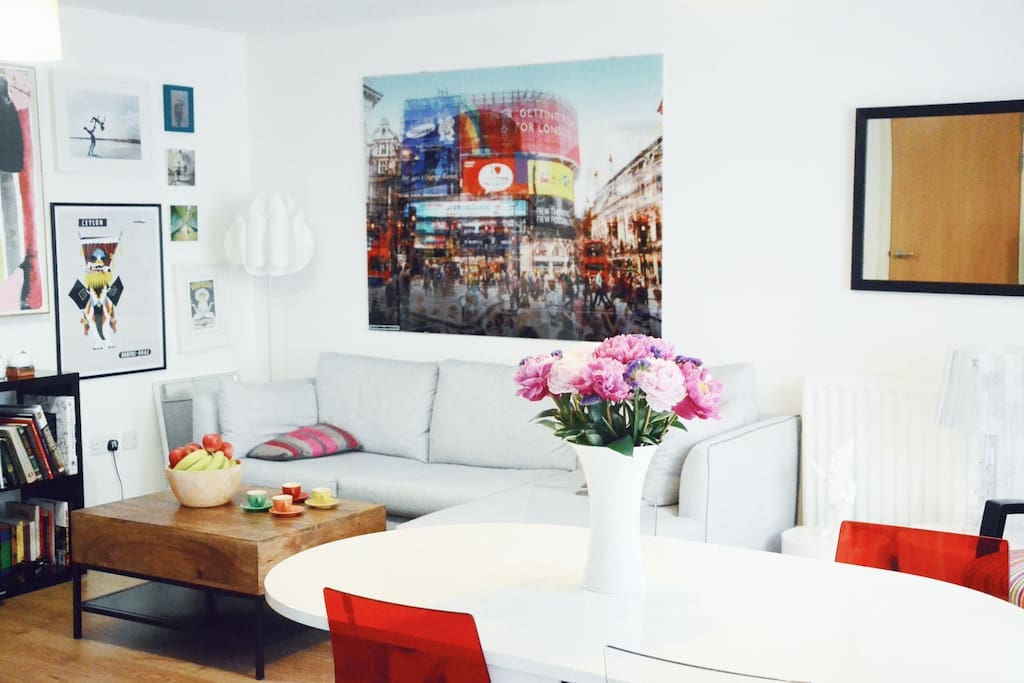 Modern decor living room (with foldout white dinner table and double sofa bed)