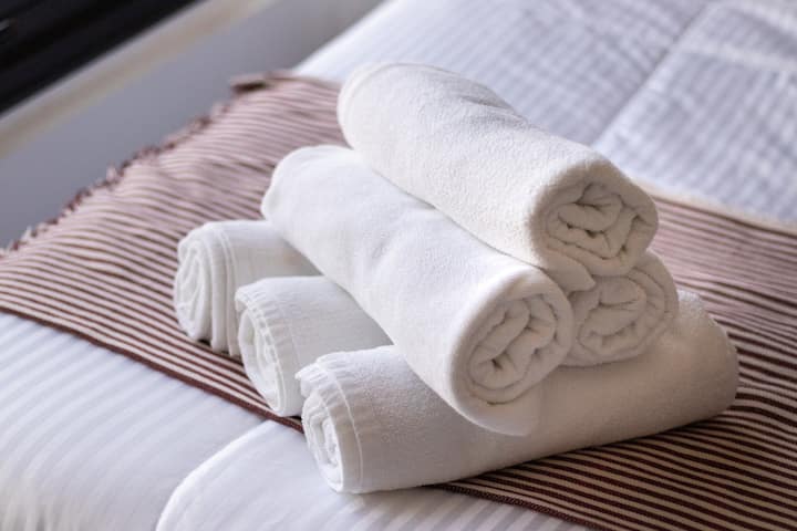 We source white hotel grade towels for the comfort of our guests. 