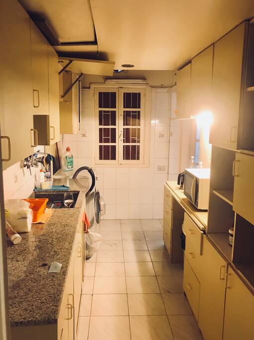 Full kitchen (microwave, kettle, stove, washing machine, 2 fridges)