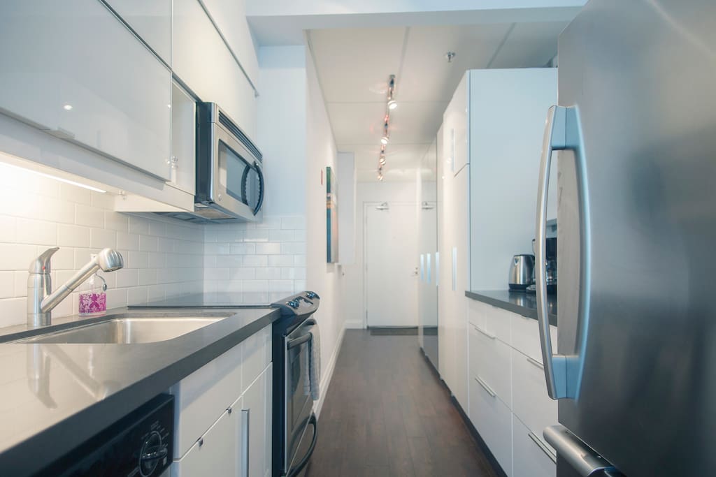 Walk in the front door to a beautiful kitchen with stainless steel appliances