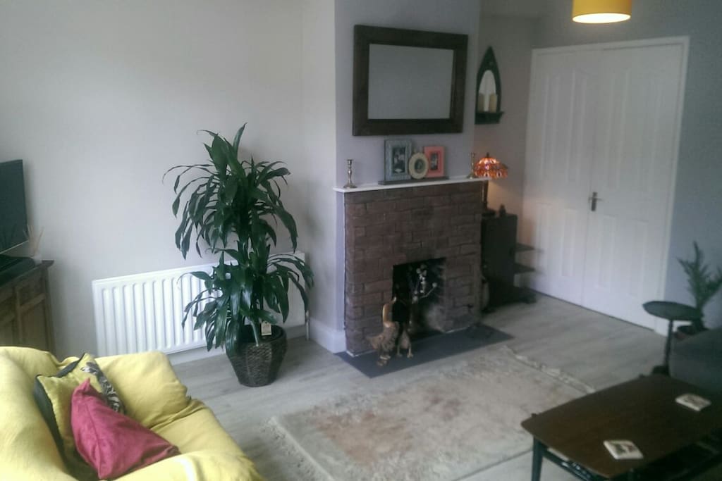 sitting room with television and channels
