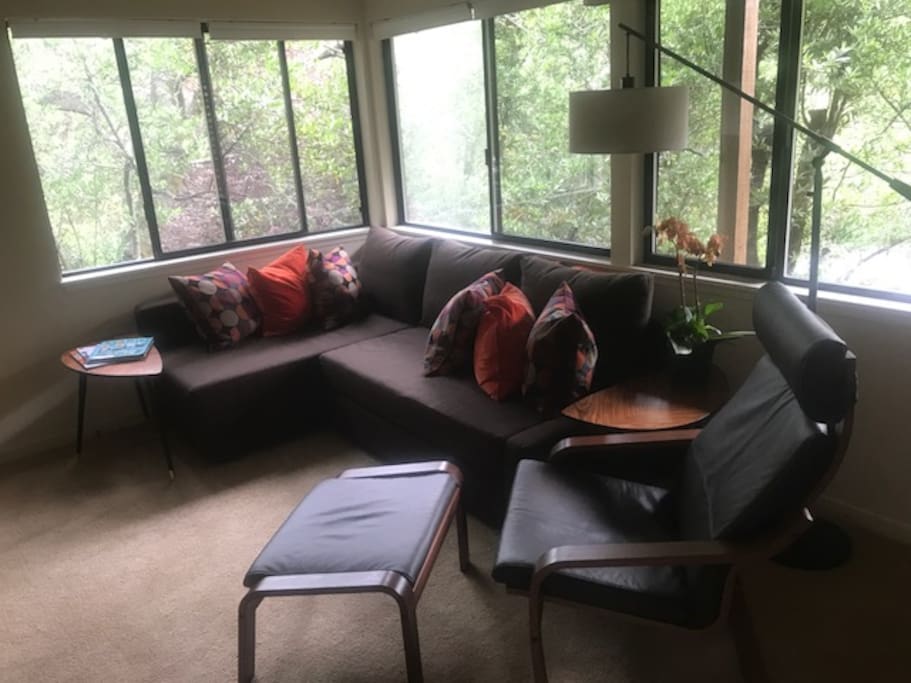 Modular couch opens into a queen bed.