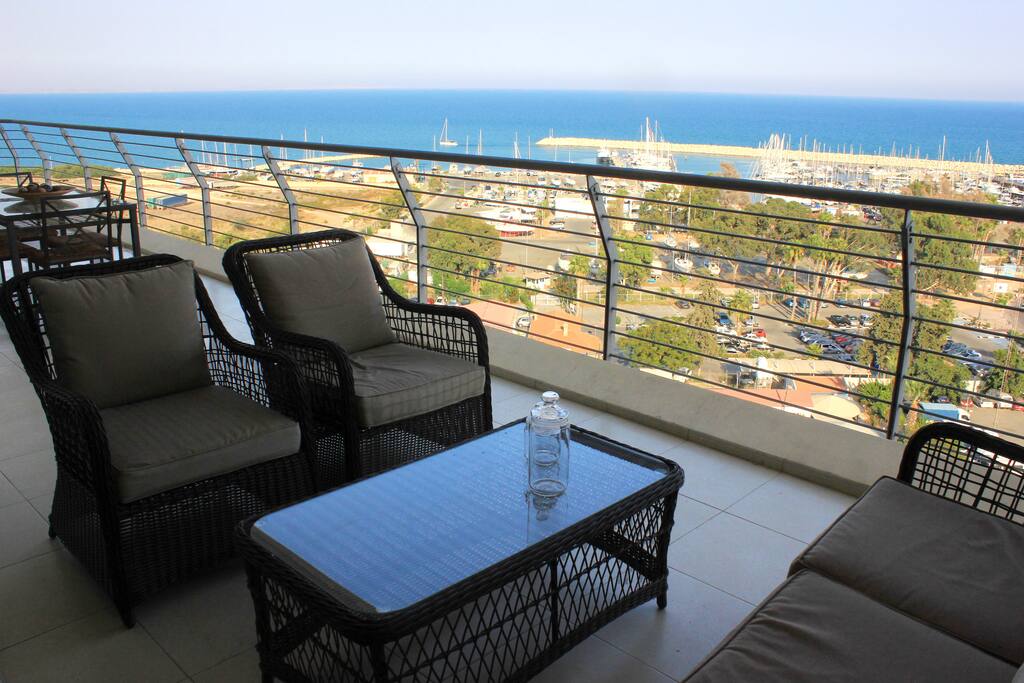 Large covered veranda lounge set with sea view!