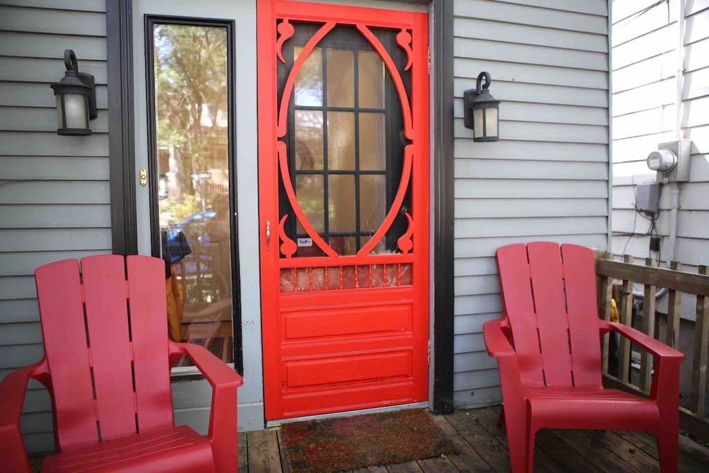 Bright red entrance door - you can't miss us!