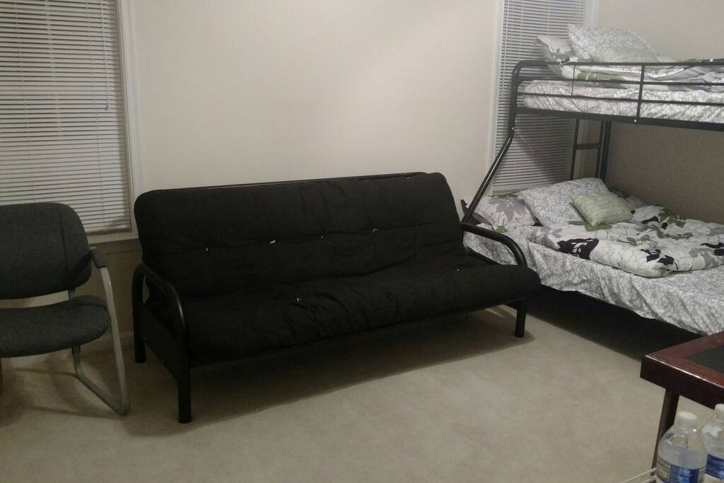 Futon that can be pulled out to a full size bed.
