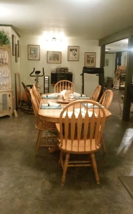 Large Dining Table for 6. High Chair Available TreadClimber, Exercise Bike