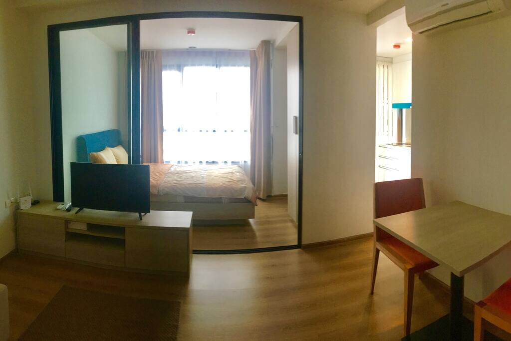 Living area to the bright bedroom