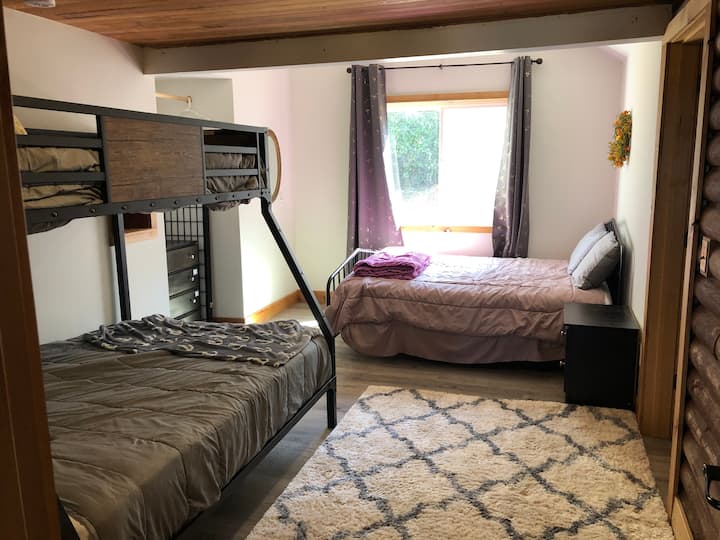 Second bedroom with twin/full bunk and queen beds