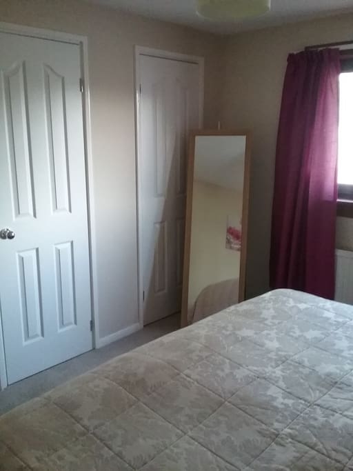 bedroom 1 has a full length mirror