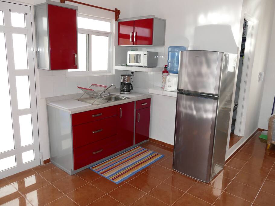 Microwave, 2 burner electric stove, coffee maker, blender, toaster, fire extinguisher