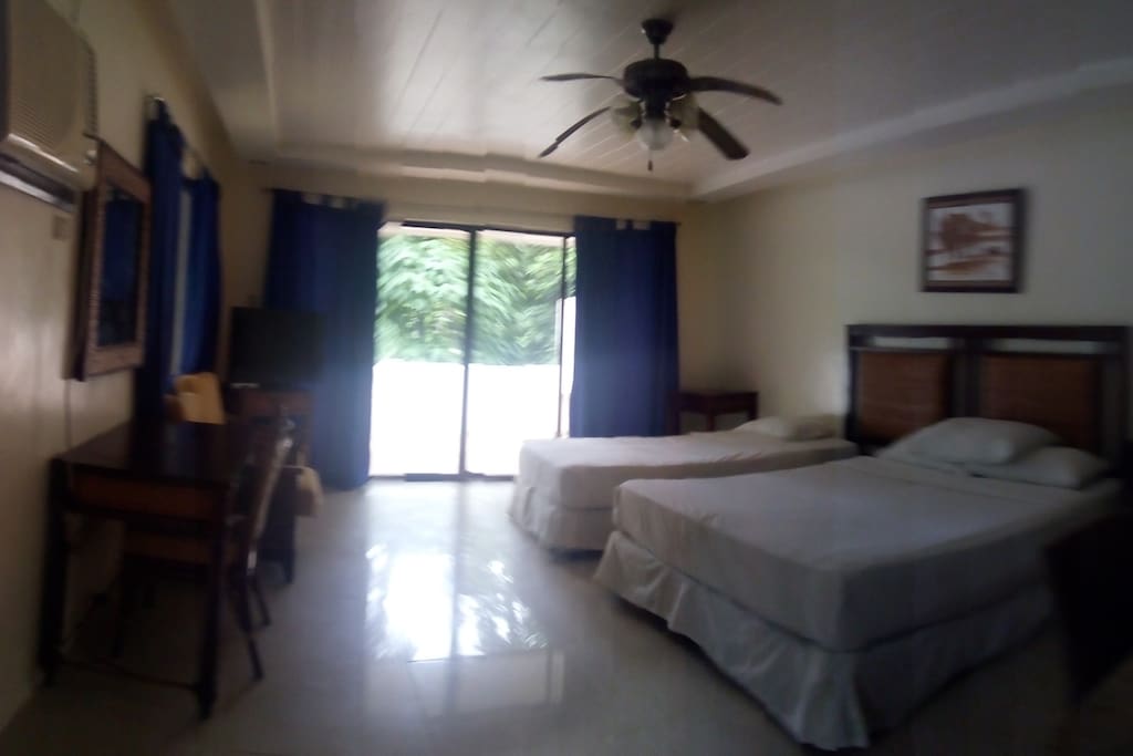 Main room with 1 double and single bed