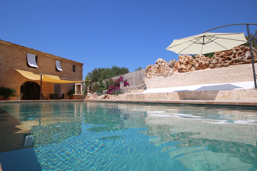 Large garden with pool.