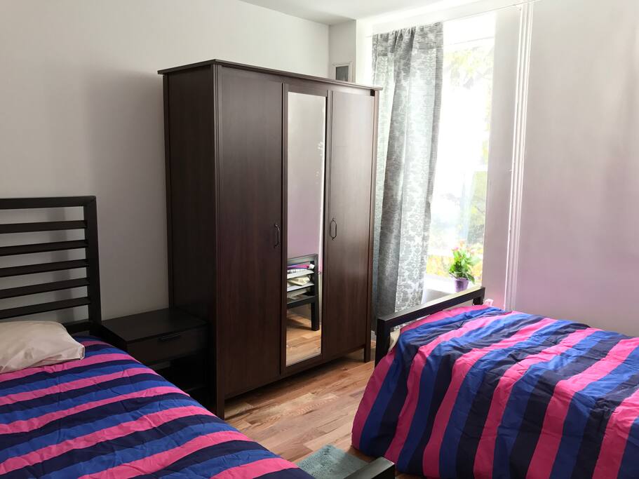 The first room for 2 people with single beds