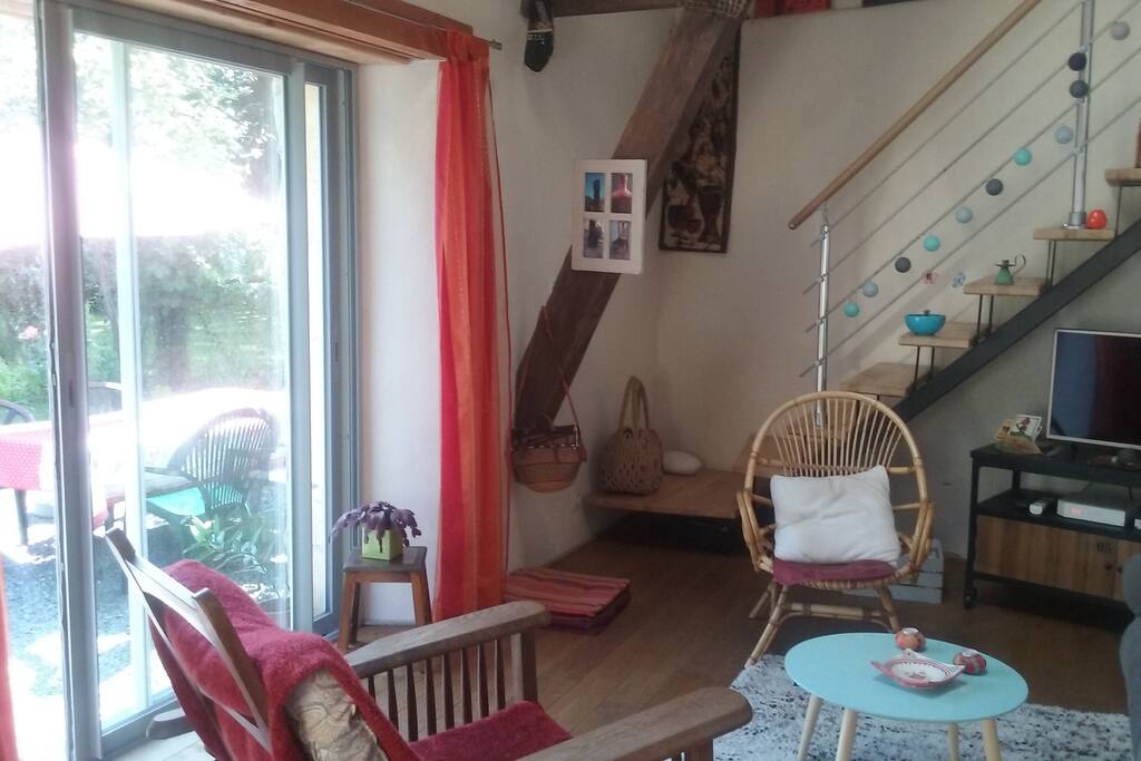 Un salon cocoon ouvert sur le jardin