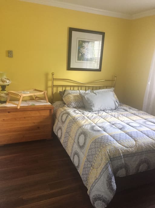 Comfy queen size bed, clean bedding, closet and dresser