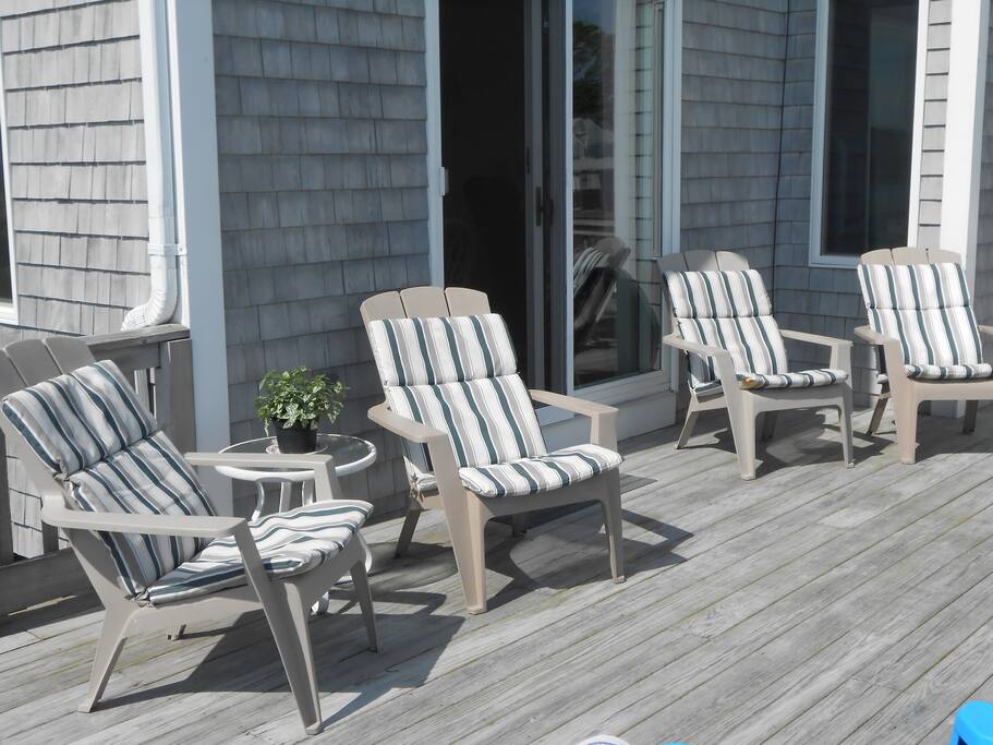 Another seating area looking toward glass slider to the deck.