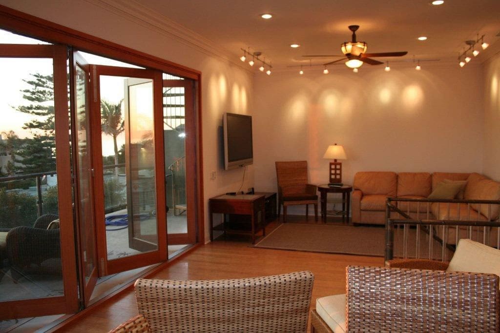 Spacious Living Area upstairs and water views. High Ceilings