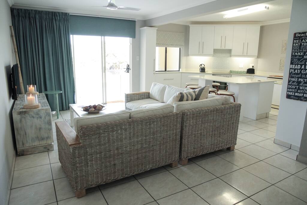 A very spacious open plan kitchen/living room area leading onto the outside area.