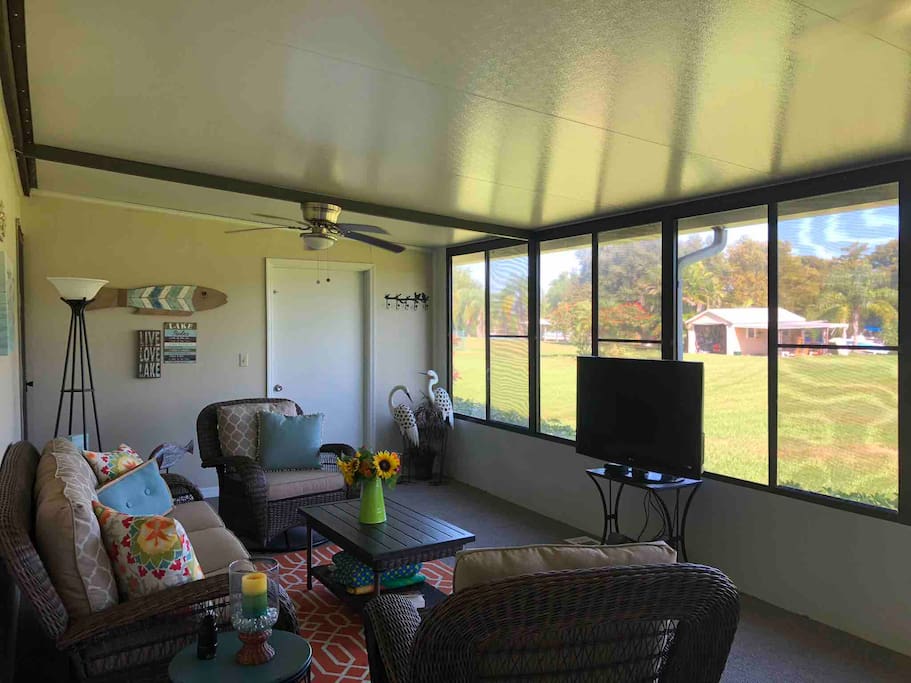 Air Conditioned back porch. Views of Taylor Creek from couch.