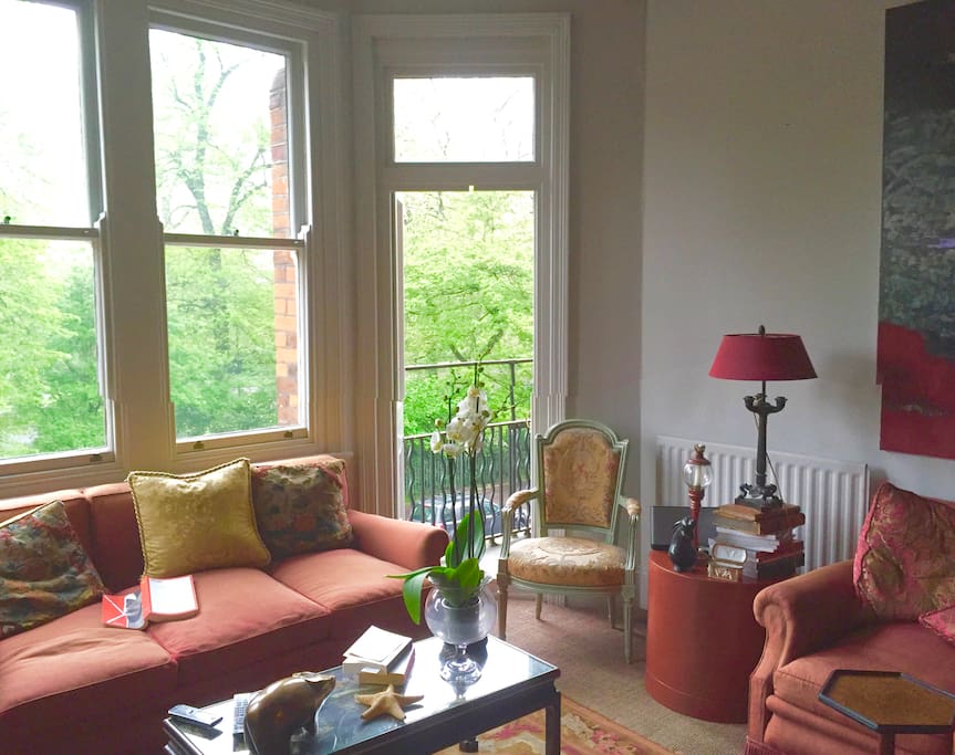 Living-room leading to balcony over park