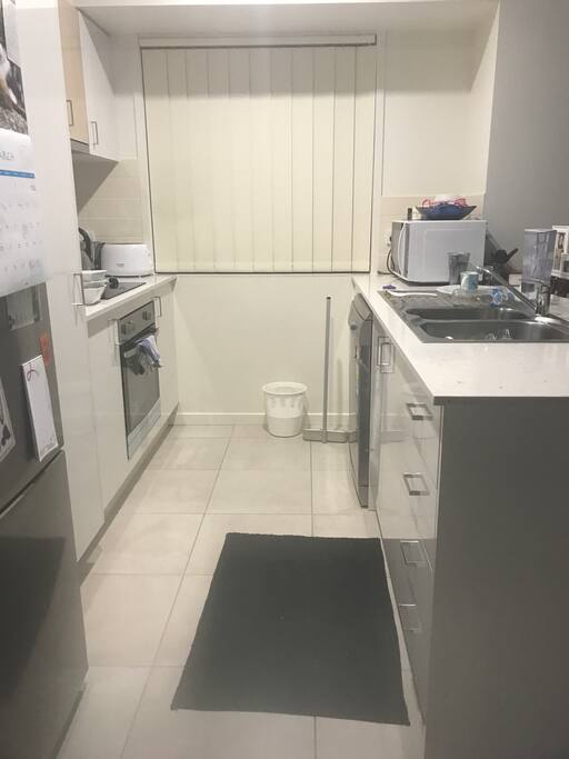 The always clean and neat kitchen with dishwasher for convenience and a large fridge and freezer!