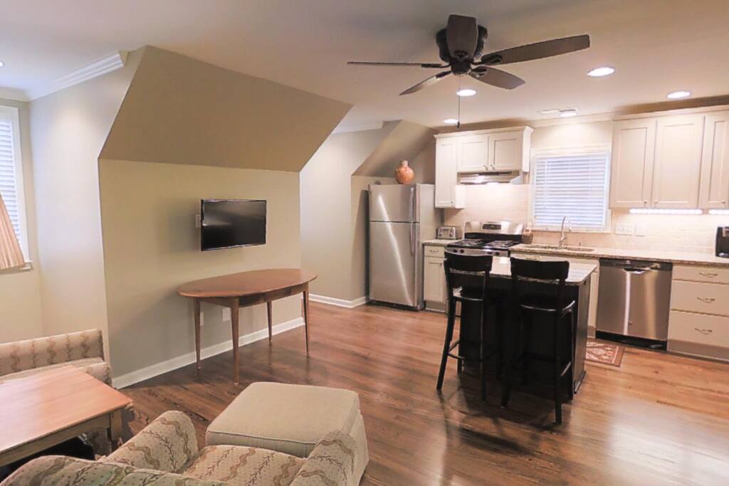 Looking from the bedroom to the living room and the kitchen.