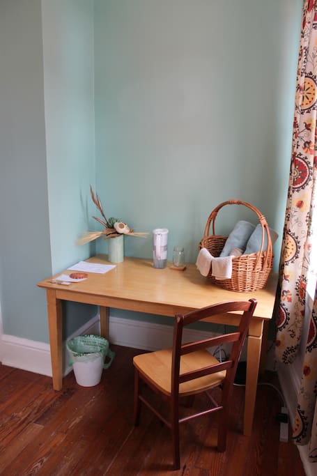 Desk, neighborhood map, towels, and a Brita water pitcher for all your travel needs.