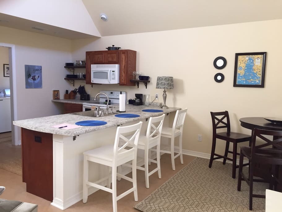 Open kitchen with dining area.