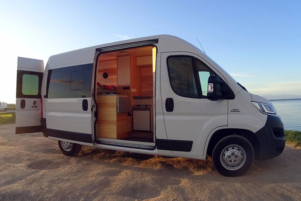 Our campervan is Ducato L2H2, 2017, 130KM. It's small enough to maneuver easily and big enough to stand inside.