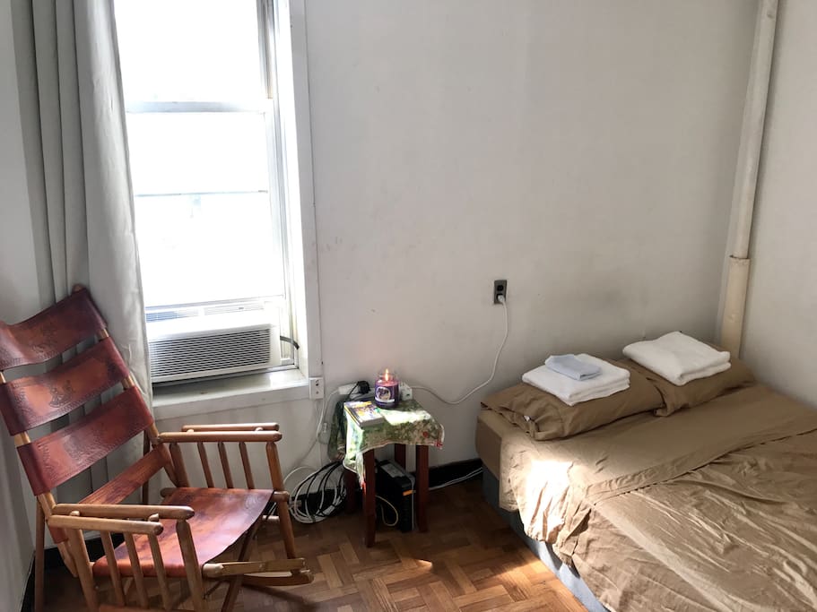Comfortable memory foam bed from startup Casper, fresh towels, clean cotton sheets, WiFi router in the room, USB ports, and an international converter