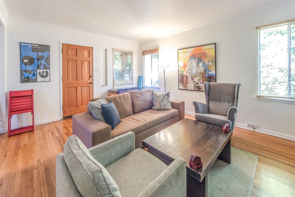 A shot of the living room, where guests can relax and watch FiOS cable.