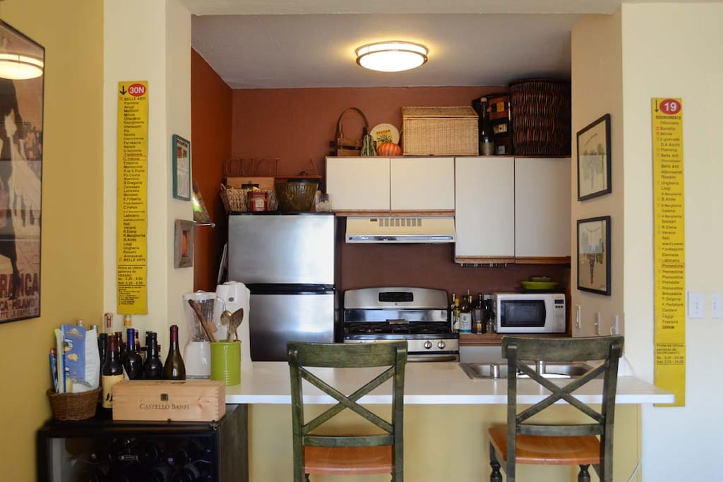 The kitchen has all stainless appliances.
