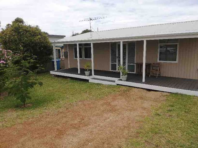 Cheerful 3 bedroom home with large backyard.