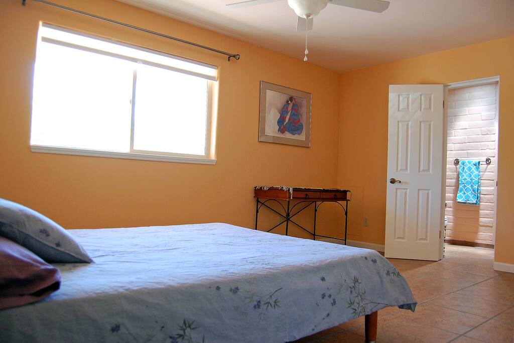Private bath accessed through bedroom.