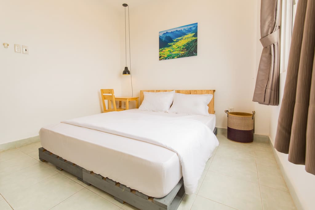Small cozy room with comfy bed