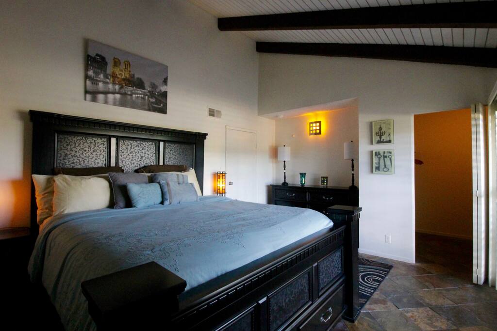 Master bedroom with California King and walk-in closet.