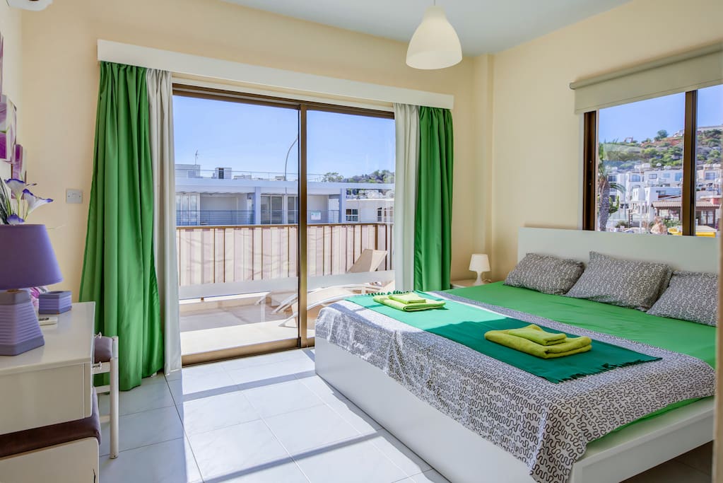 Large King Size Bed with Balcony Views of Fig Tree Bay