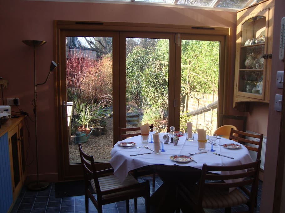 Glass roof to this dinning area so very light